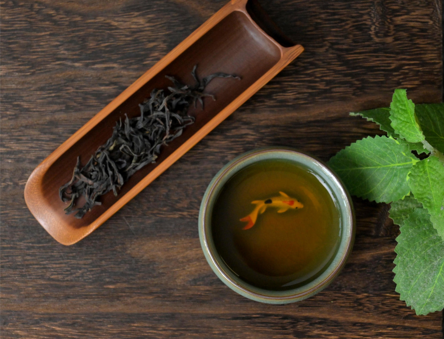 Longquan celadon Ge kiln plum green "Little Fish" Gongfu tea cup.