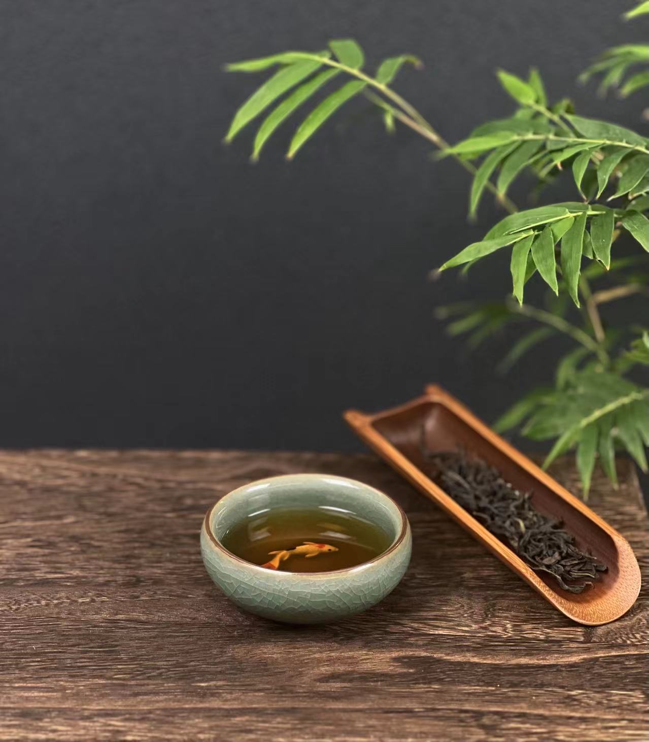 Longquan celadon Ge kiln plum green "Little Fish" Gongfu tea cup.