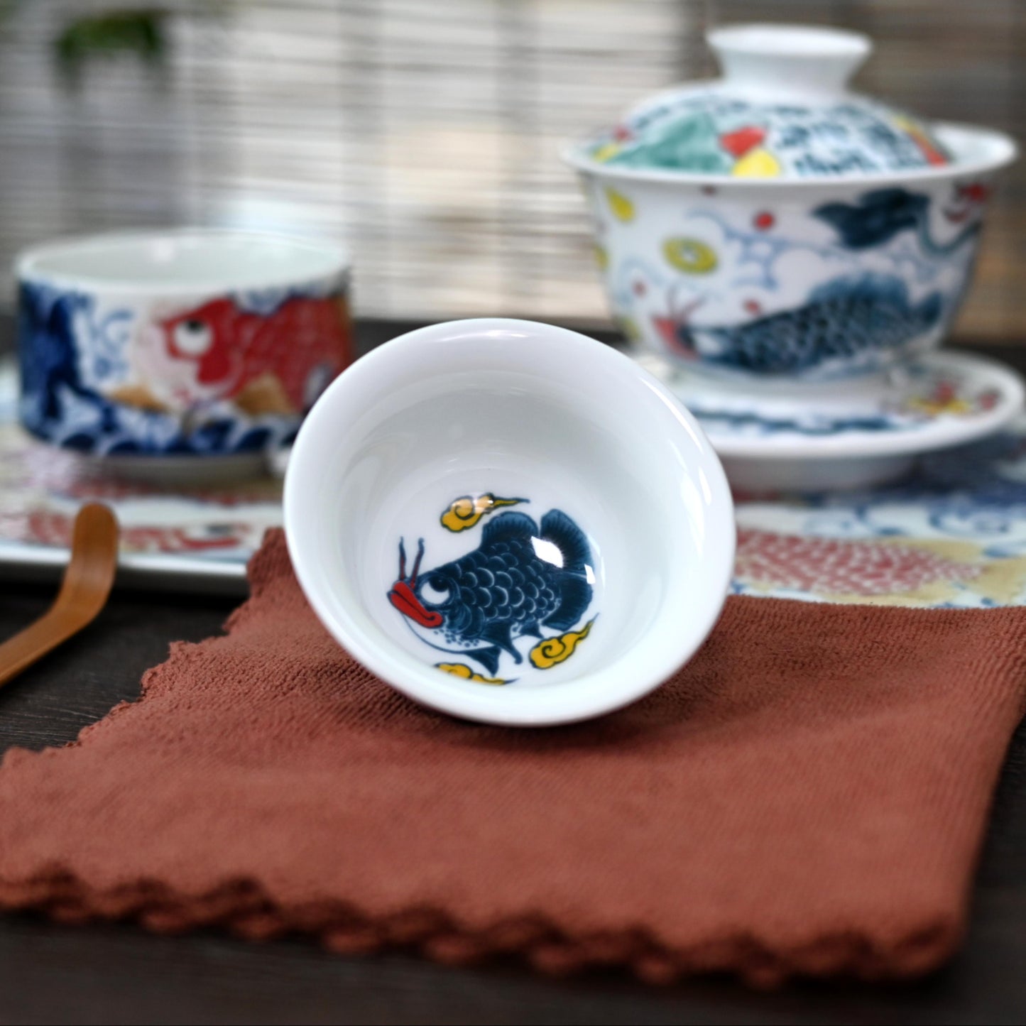 Underglaze Polychrome Asian Arowana Host Tea Cup