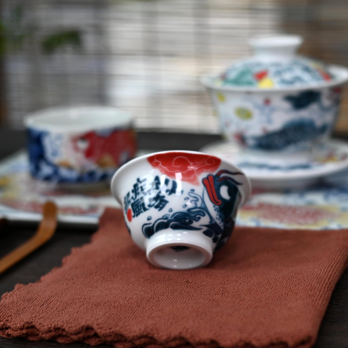 Underglaze Polychrome Asian Arowana Host Tea Cup