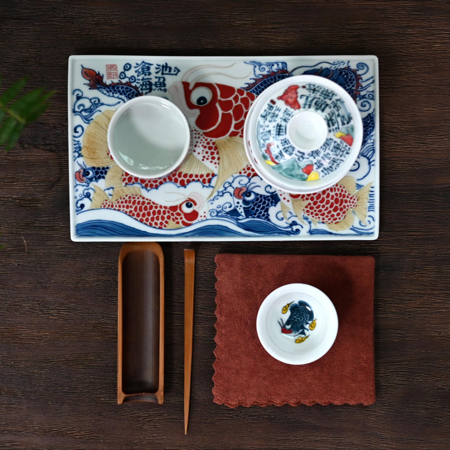 Underglaze Polychrome Asian Arowana Host Tea Cup