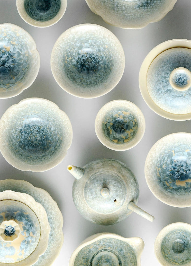 Handcrafted Smoky Cyan Glaze teapot featuring unique kiln-change crystal ice flower pattern.