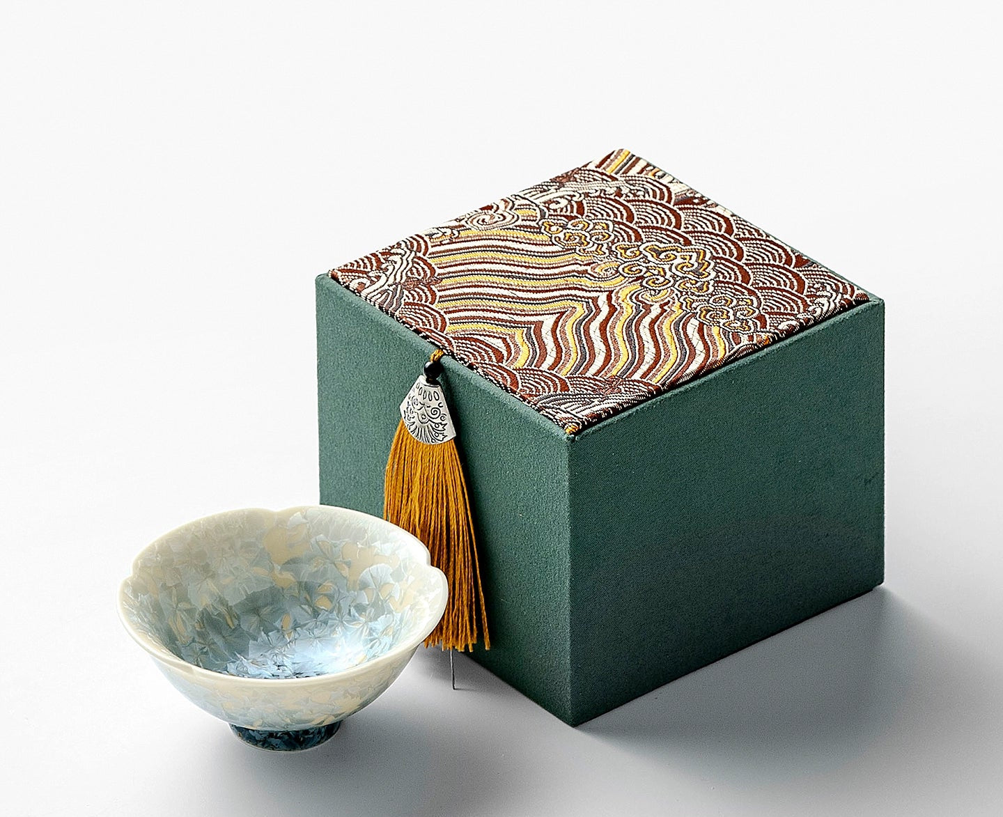 Handcrafted crystal ice flower teacup in smoky cyan kiln glaze