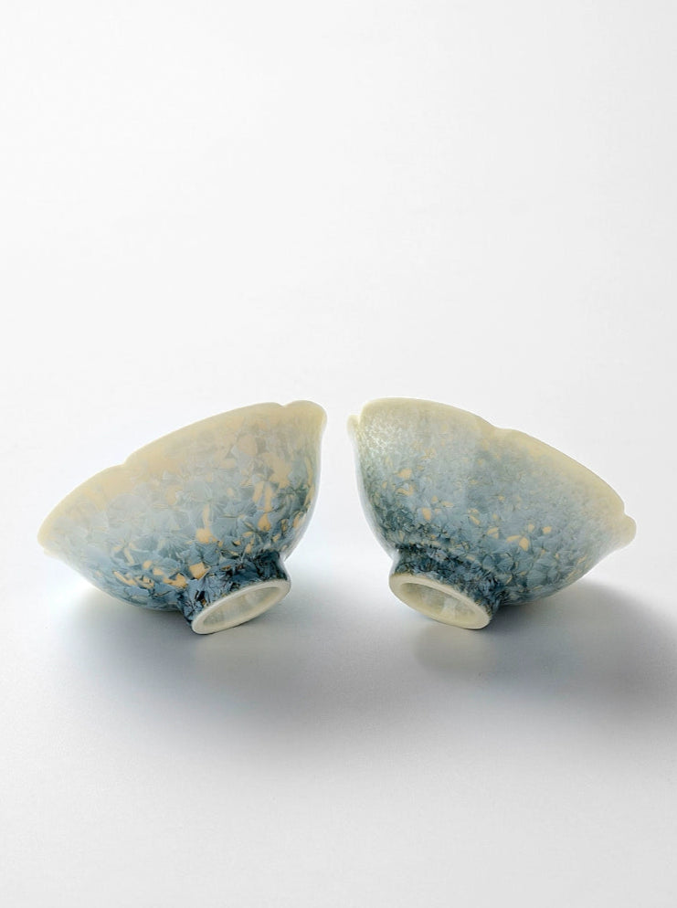 Smoky Cyan Glaze teacup with kiln-change crystal ice flower design, perfect for elegant tea moments.