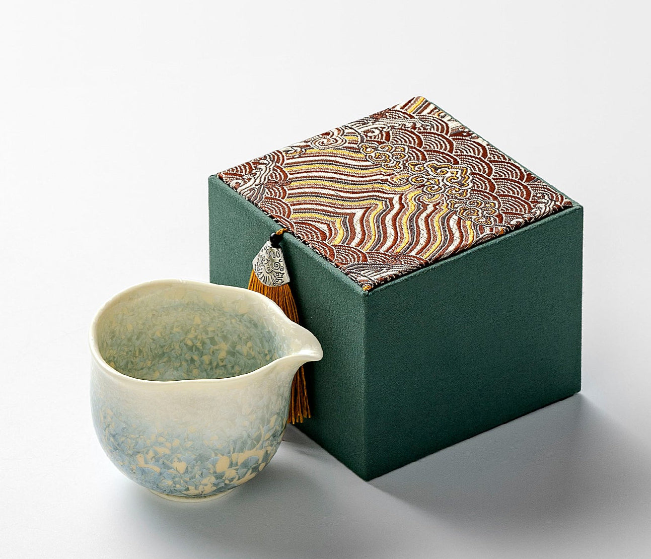 Chinese ceramic teacup with smoky cyan glaze and unique kiln-change patterns