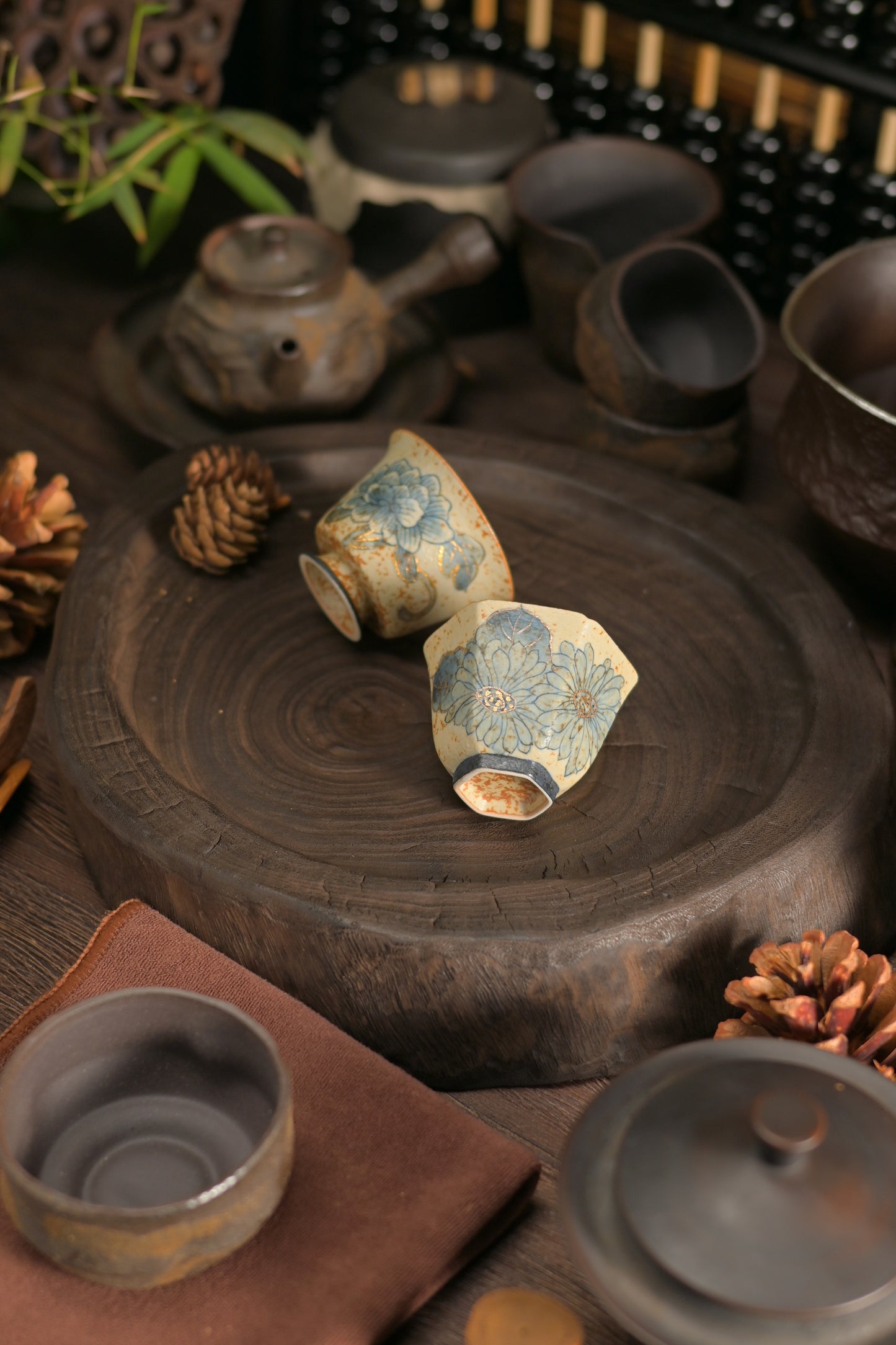 Old Clay Blue-and-White Volcanic Stone Caramel Glaze Tea Cup (45ml) with Hand-Painted Flora Design