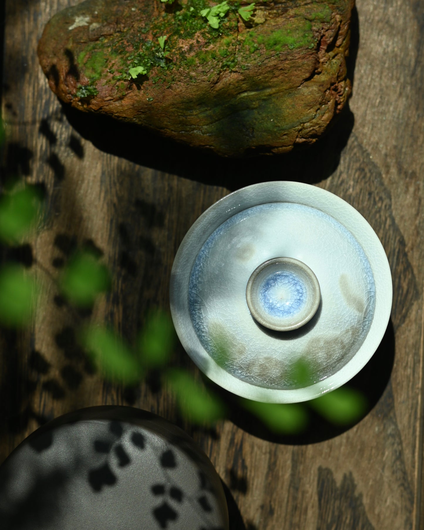 Compact 80ml gaiwan with blue-white crystalline glaze, handmade in Jingdezhen using traditional techniques