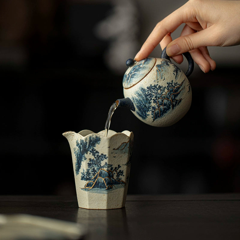 Traditional Chinese Porcelain Fair Cup Featuring Blue and White Landscape Painting
