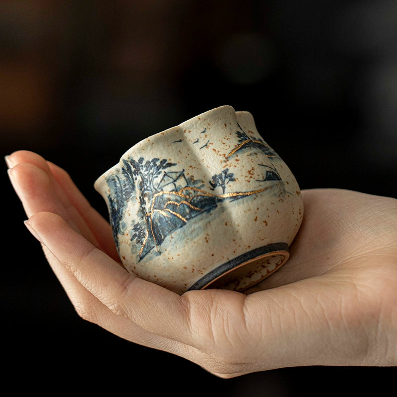Artistic Petal-shaped Teacup with Blue and White Porcelain Landscape Painting