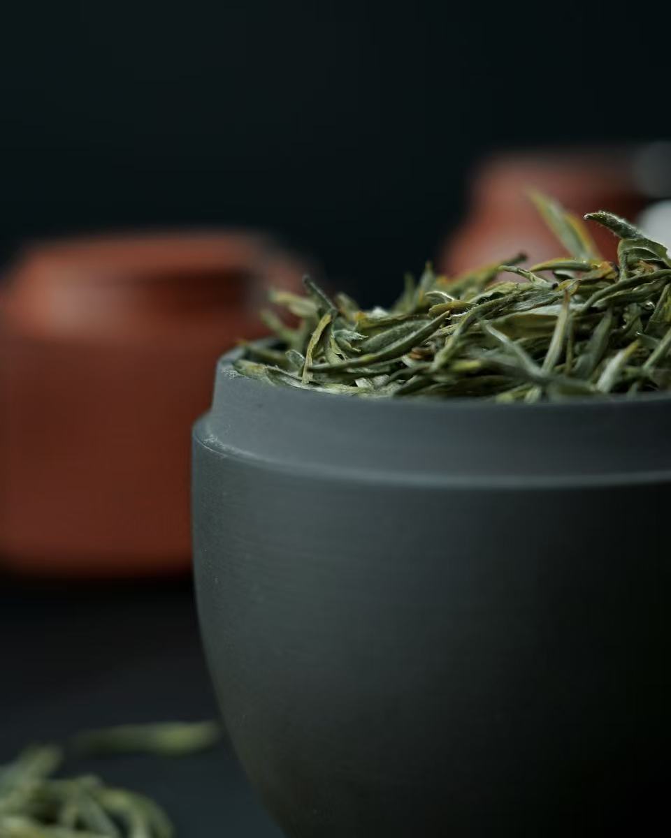 Elegant Yixing tea caddy with minimalist design, combines ancient ceramic art with contemporary tea culture needs