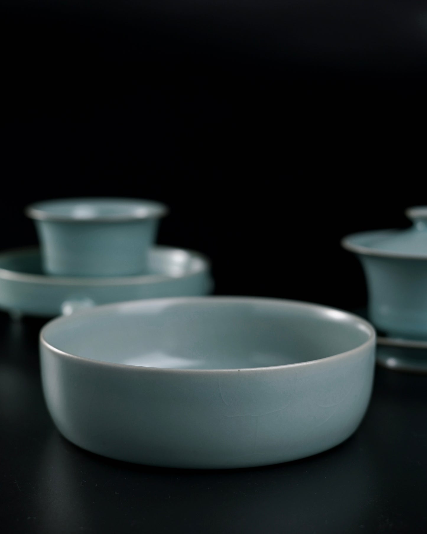 Five-pin fired Ru ware reproduction with full sky-blue glaze and flat base, mirroring rare Palace Museum artifact