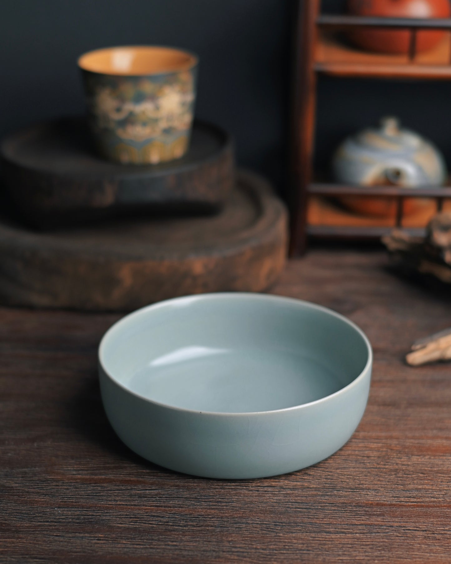 Northern Song-style Ru ware bowl replica with thin walls and thick base, showcasing classic celadon coloration