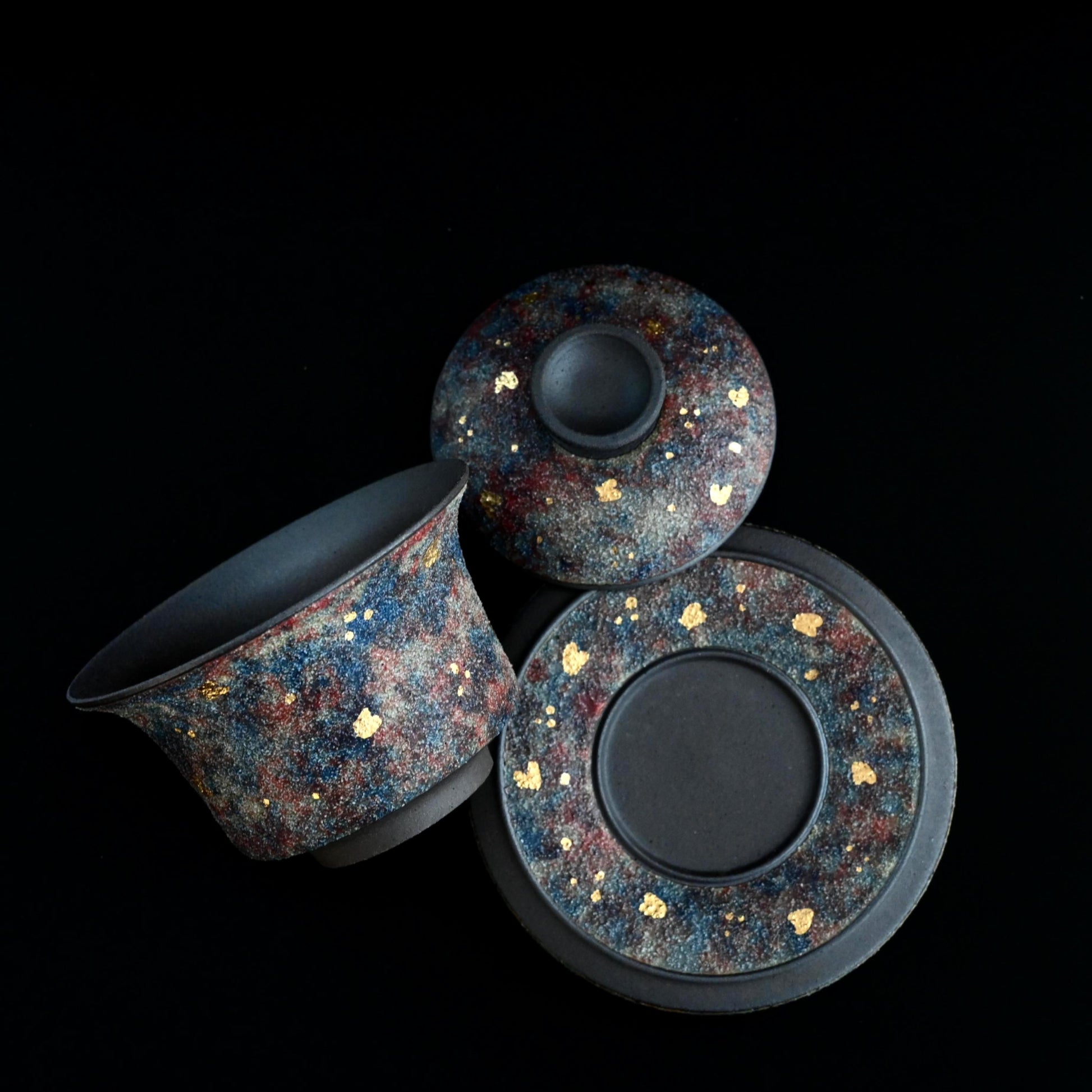 Lavish Yixing gaiwan with hand-applied gold mineral inlay on rich purple clay, embodying luxury tea ware perfection for special occasion gifting.