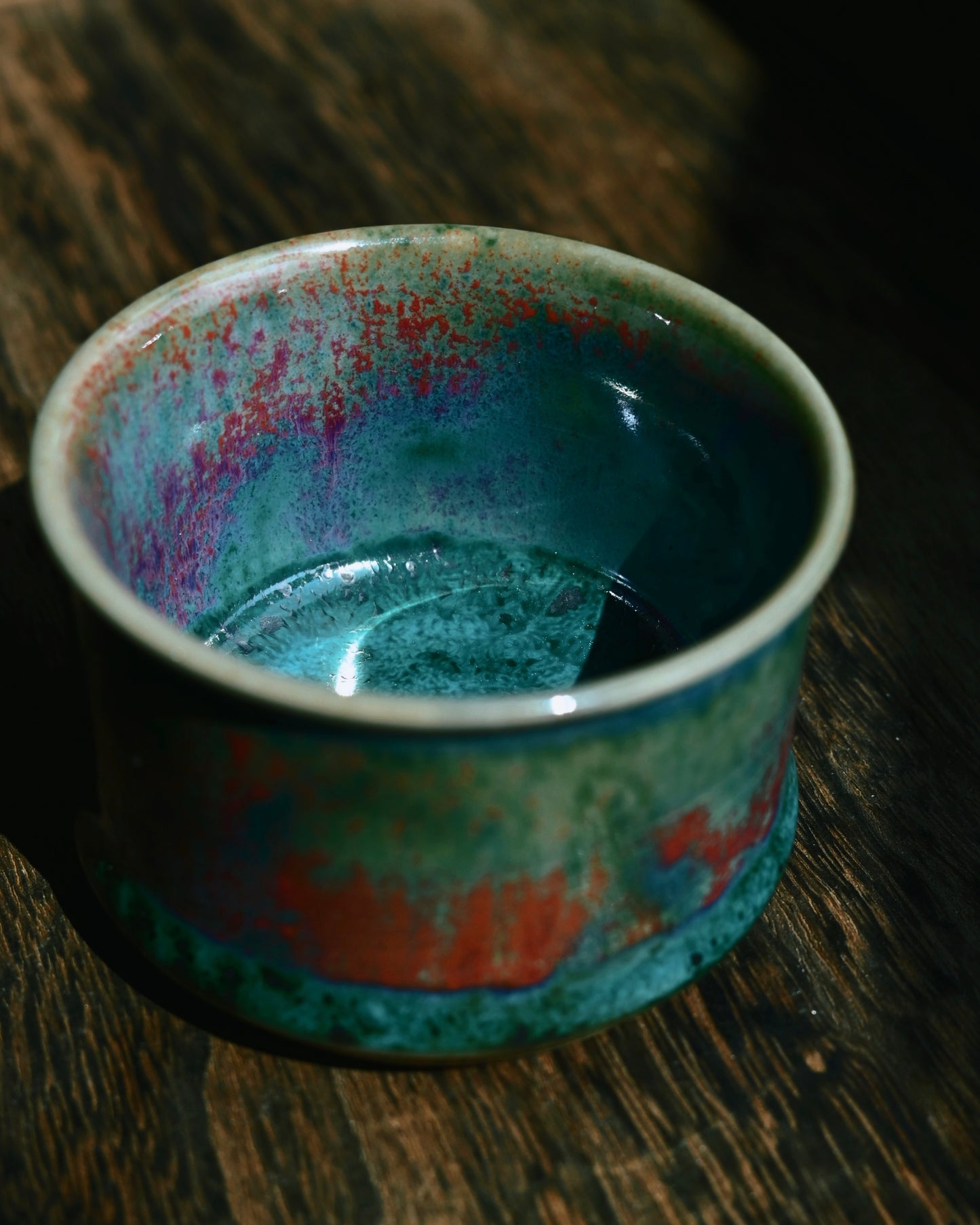 Handcrafted Jun ware bamboo shape teacup with magical green flambé glaze, horsehoof shape, and crackled texture for Chinese tea ceremony