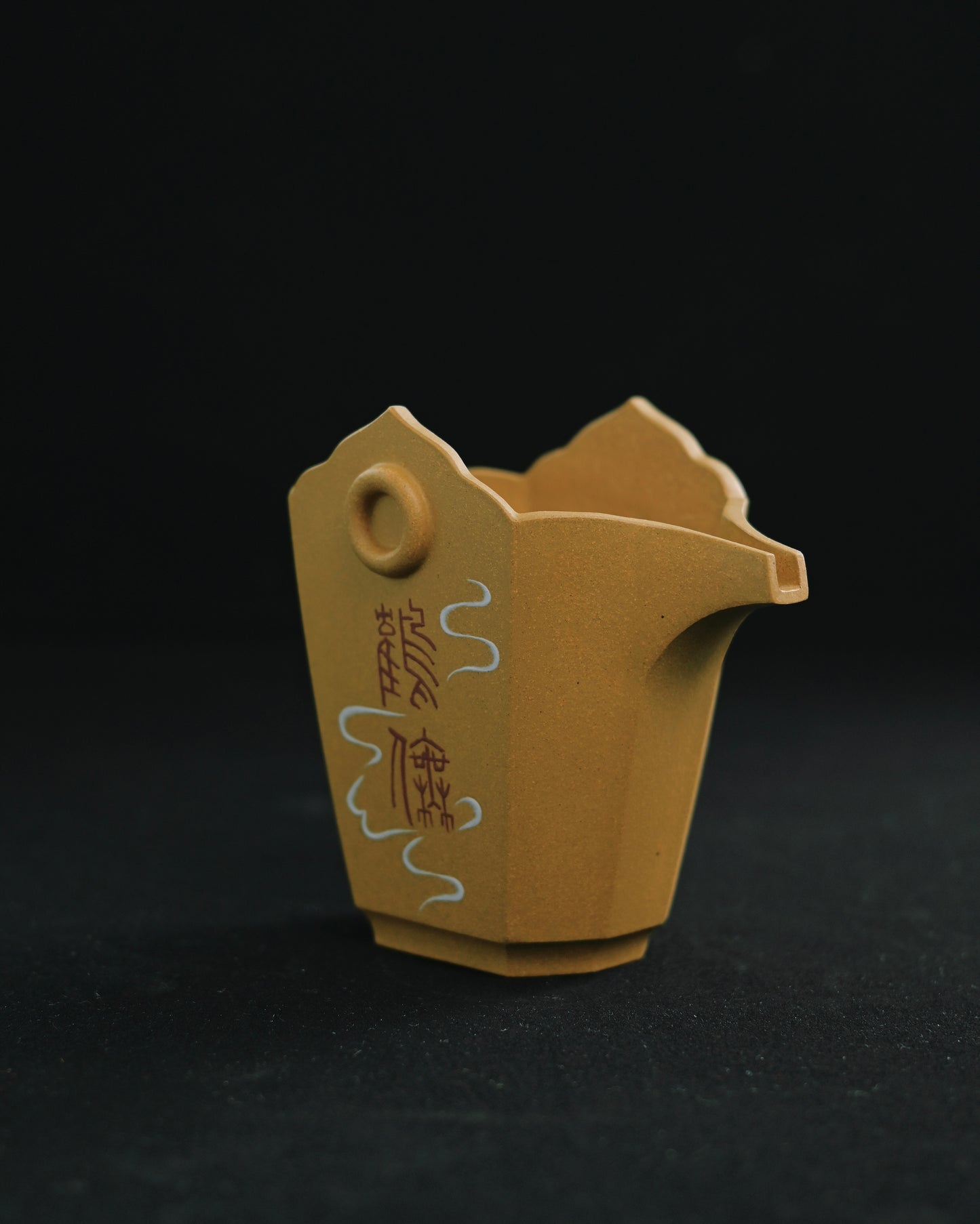 The cup held in a hand, illustrating its balanced weight and ergonomic comfort