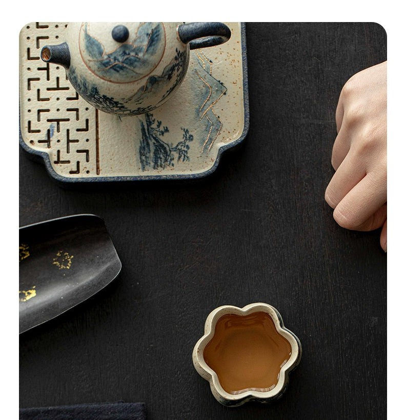 Handcrafted Porcelain Teacup Featuring Delicate Chinese Landscape in Blue and White