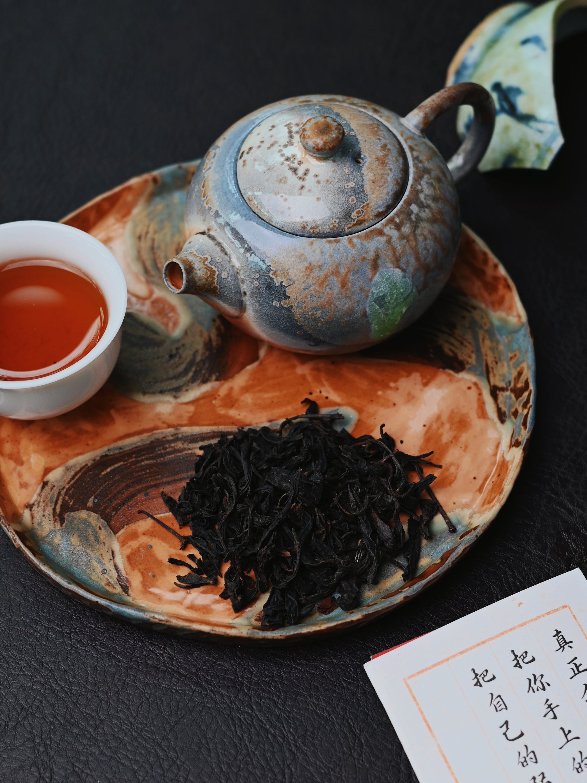 Ancient firing modern form: dragon kiln wood-fired Xishi teapot carrying natural ash glaze, crystal patterns, and fire poetry in zisha clay