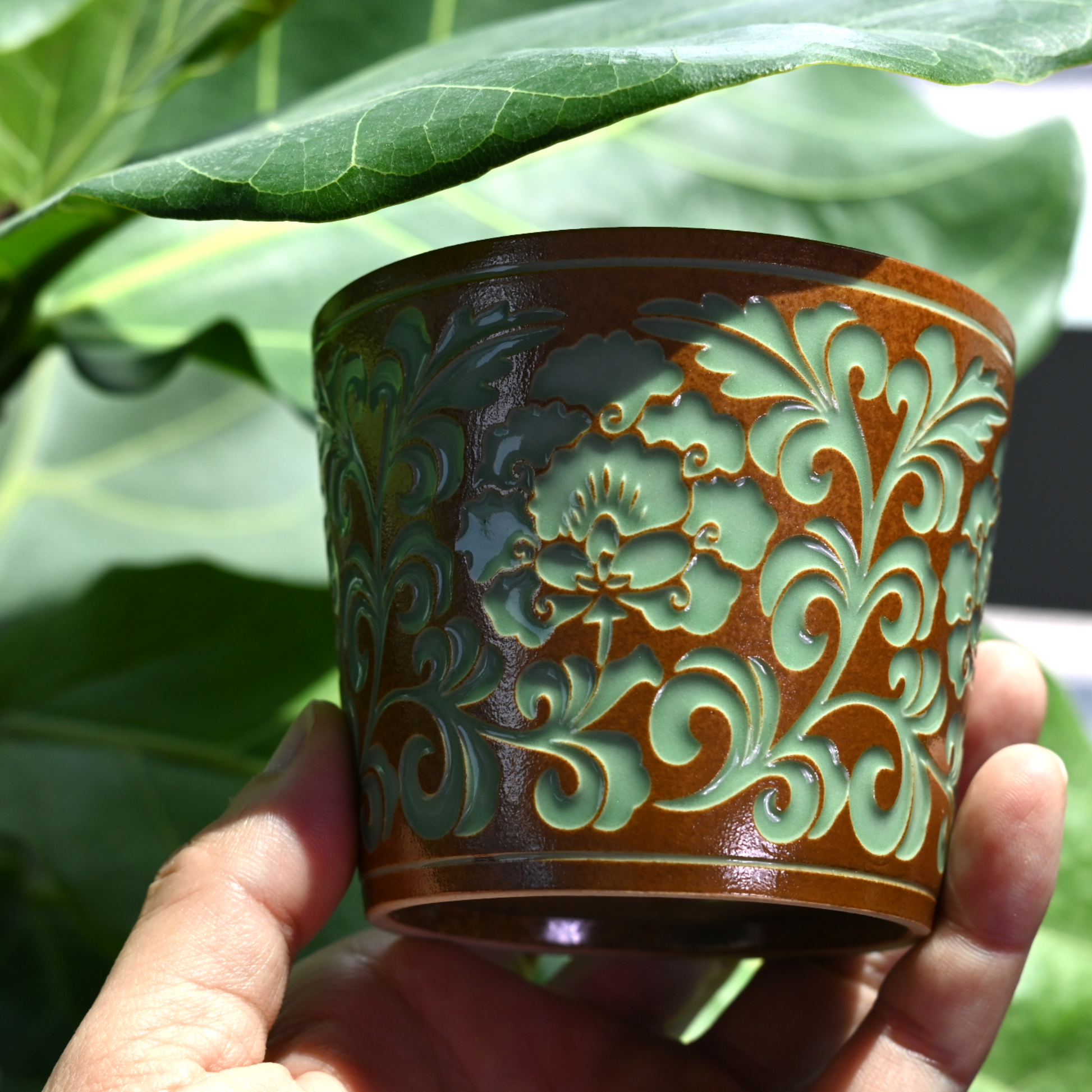 Authentic Longquan celadon from Fujian: 260ml peony-vine carved teacup with jade-like plant ash glaze, honoring 1000-year celadon traditions.