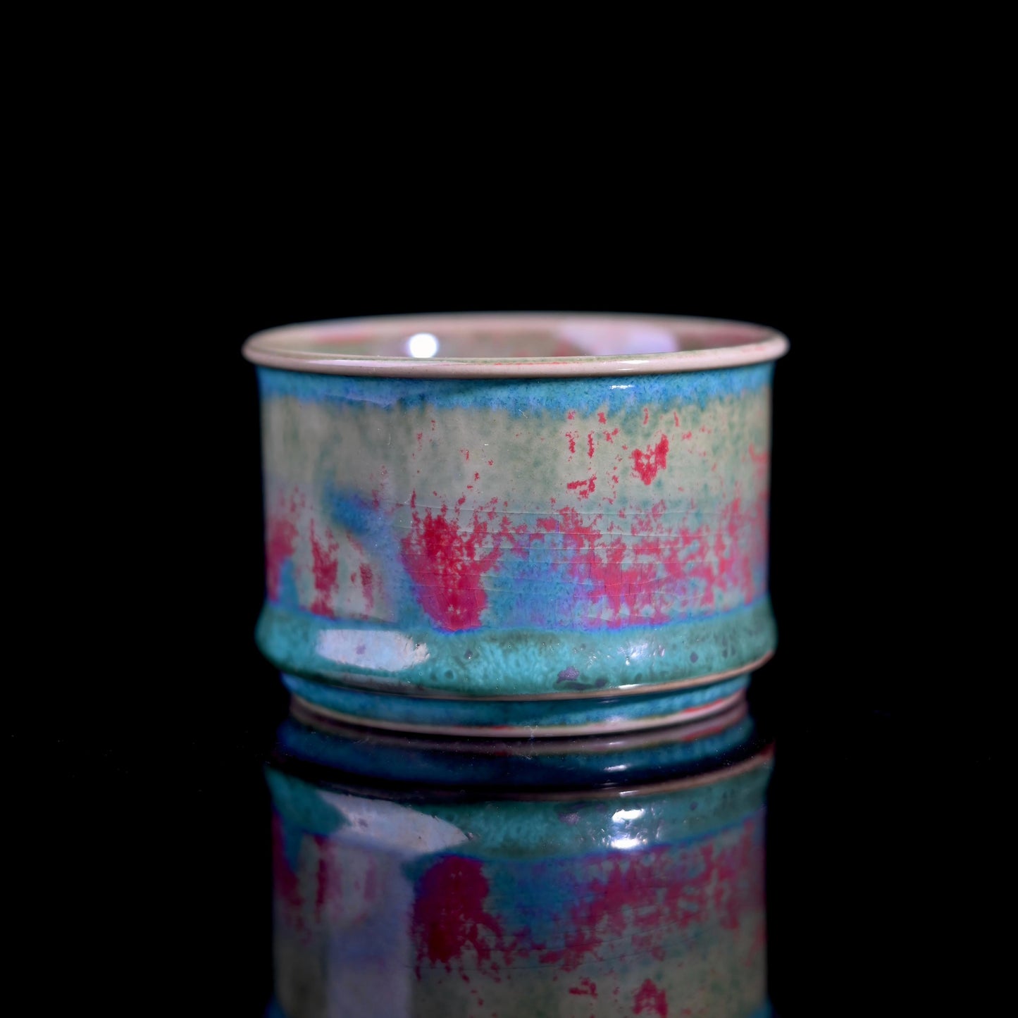 Handcrafted Jun ware teacup with magical green flambé glaze, horsehoof shape, and crackled texture for Chinese tea ceremony