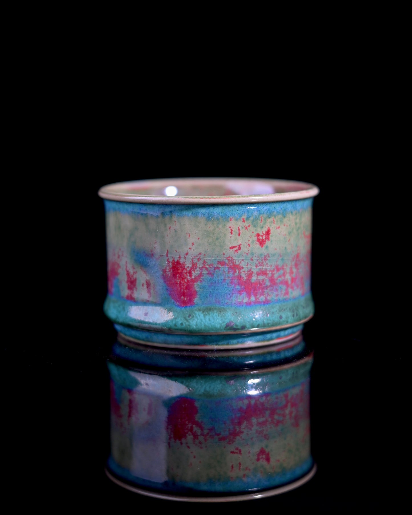 Handcrafted Jun ware teacup with magical green flambé glaze, horsehoof shape, and crackled texture for Chinese tea ceremony