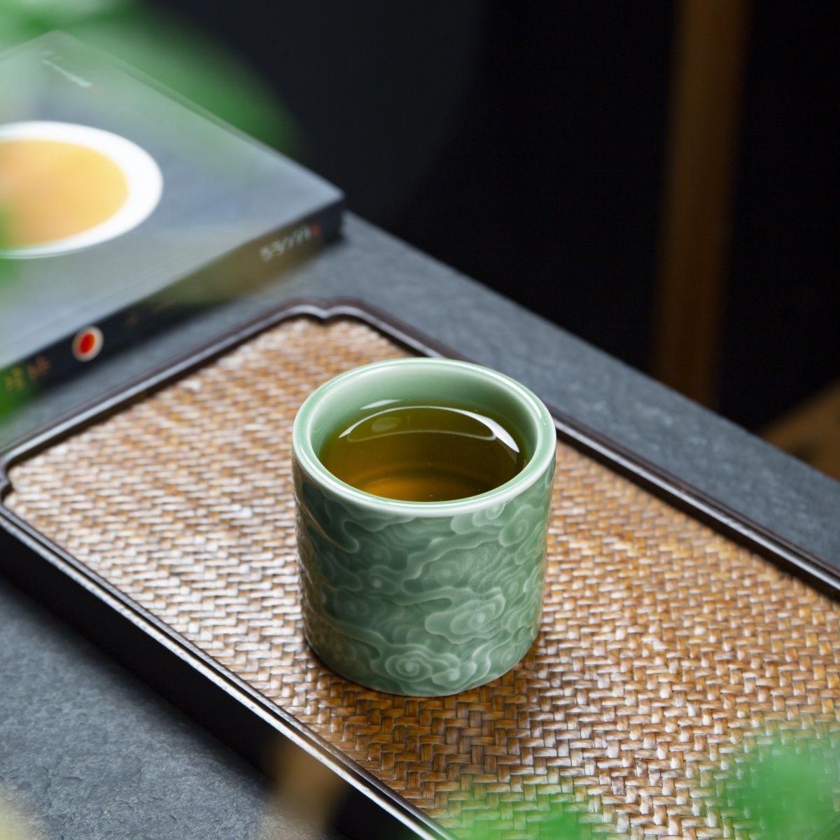 Where heritage meets elegance: the plum green Celadon Cloud Cup from Longquan.