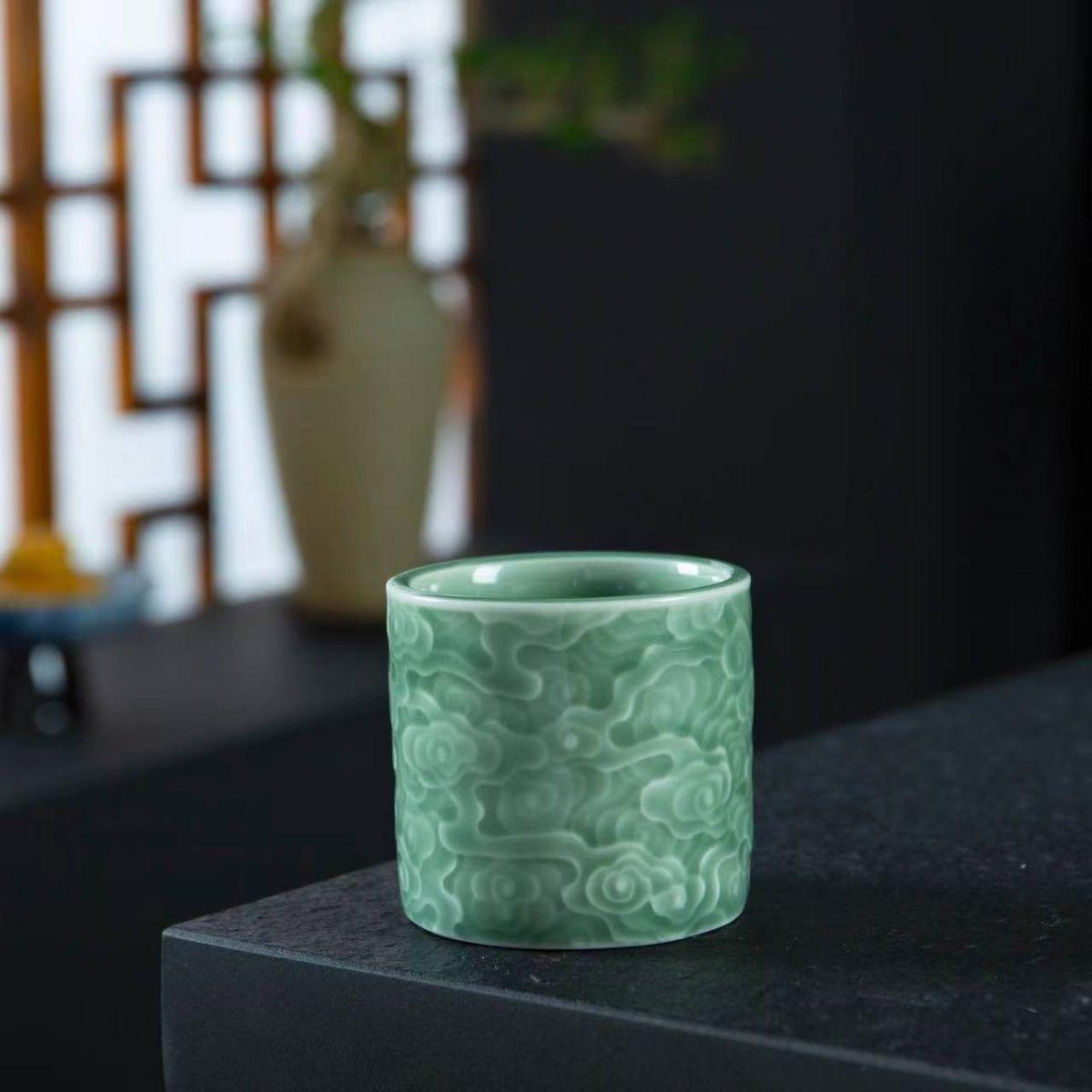 Sip serenity and style with the handcrafted Longquan Celadon Cloud Cup.