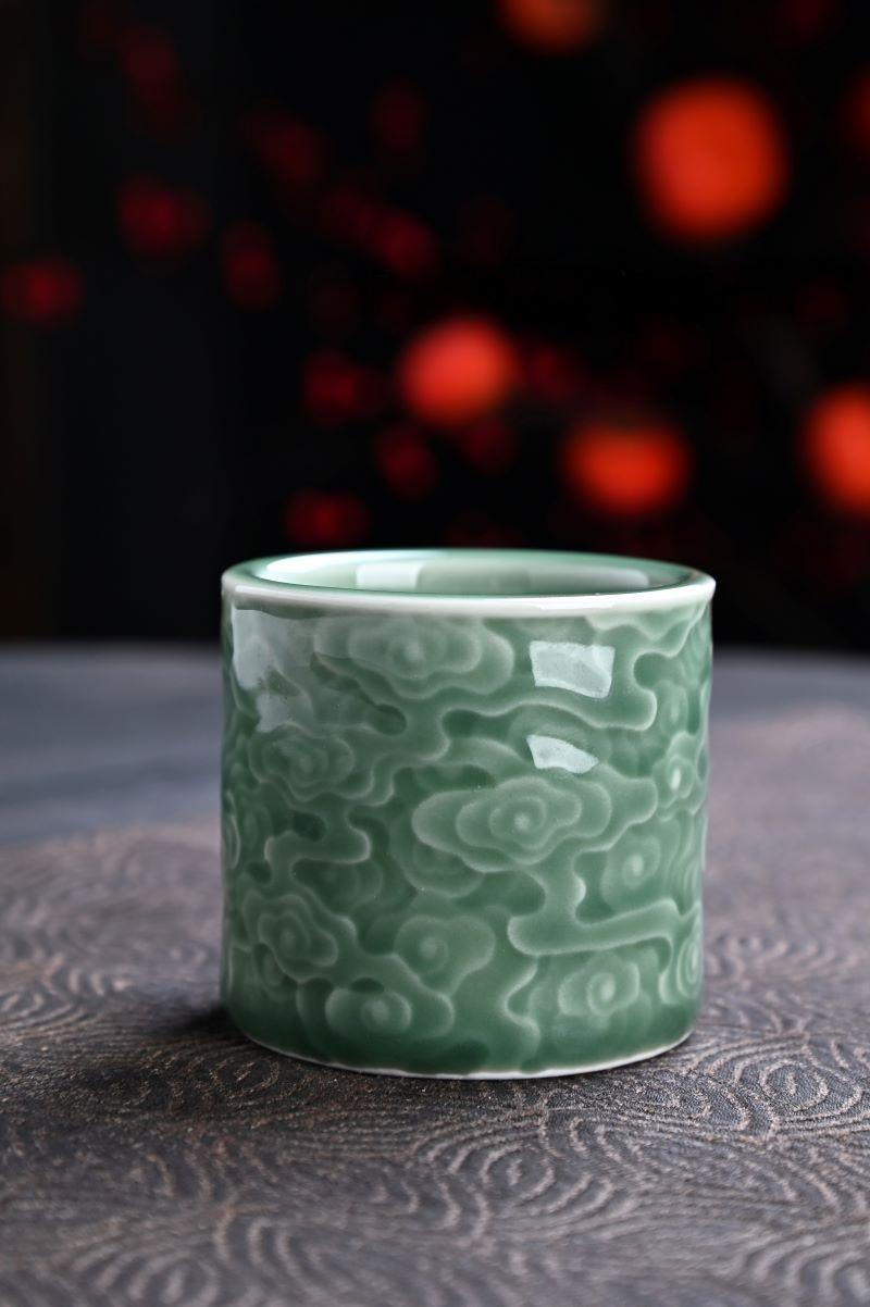 Inspired by nature’s calm—Longquan Celadon Cup with embossed cloud patterns.