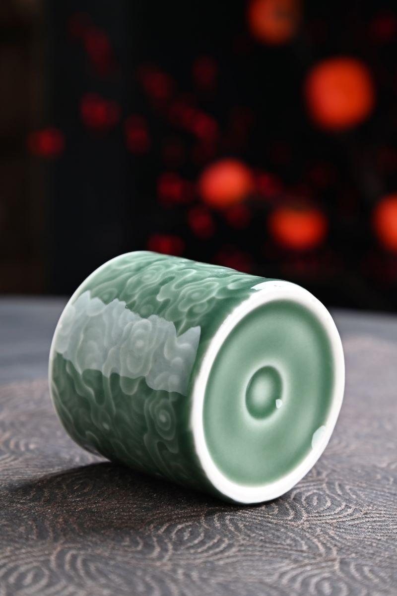 The beauty of clouds captured in a Longquan Celadon Plum Green Tea Cup.