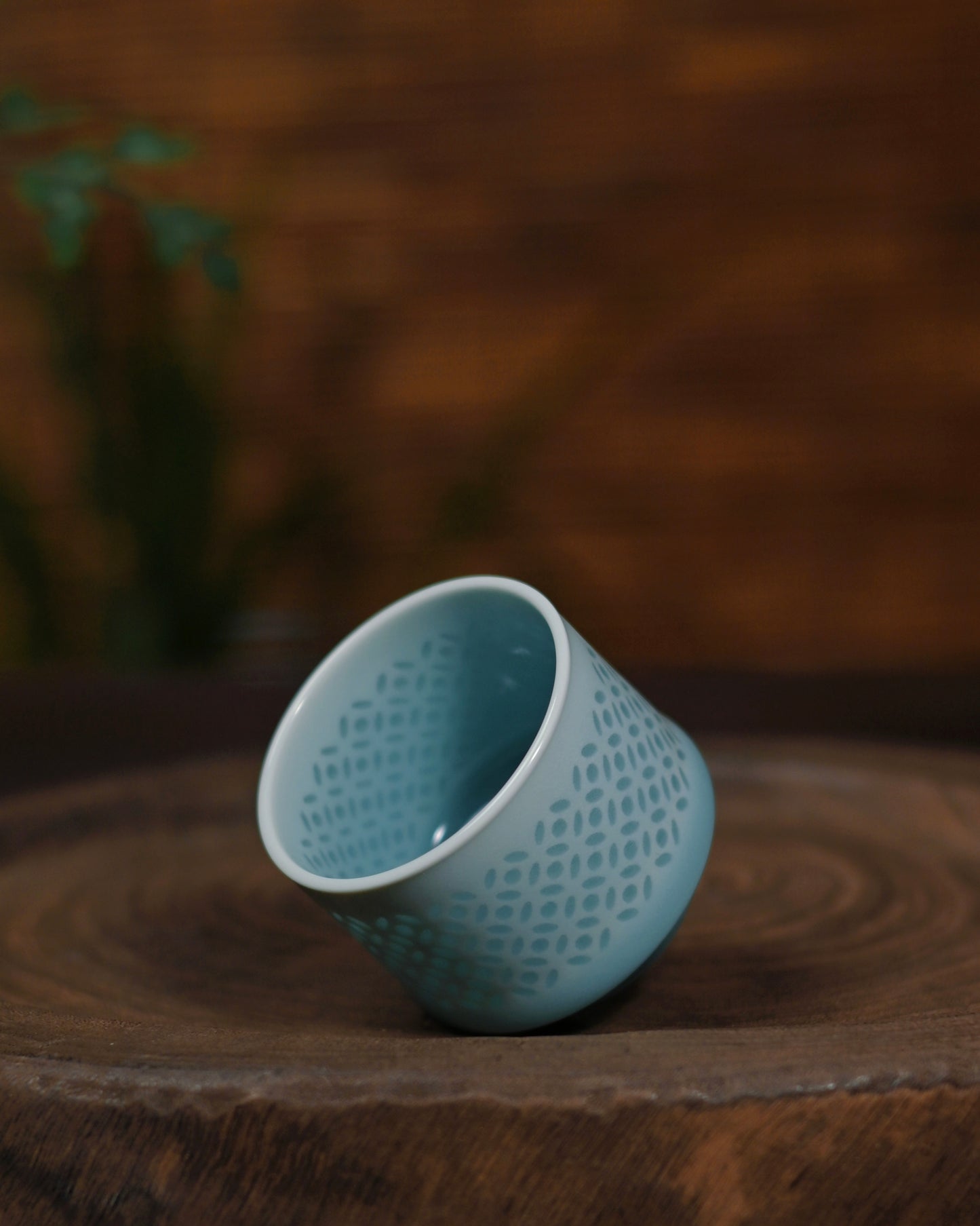 Comparison showing innovative adaptation of Linglong technique on celadon versus traditional white porcelain