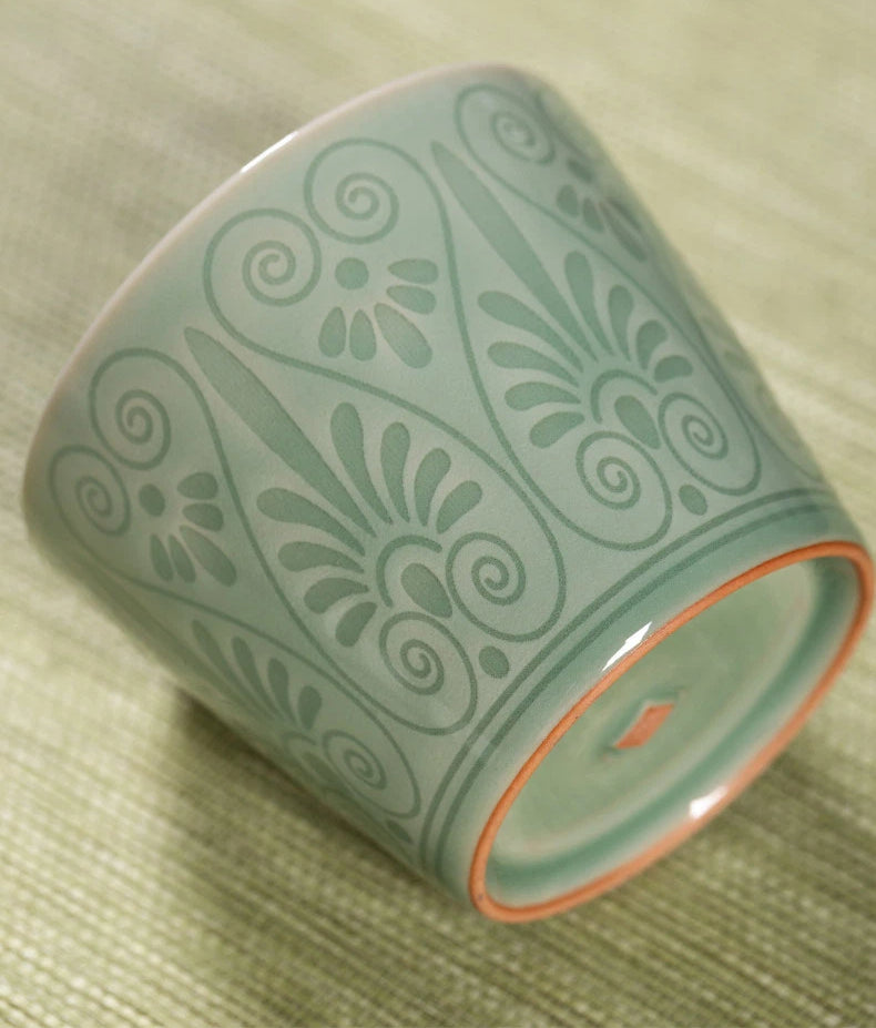 Bottom view showing the neatly finished unglazed foot ring of a handcrafted Longquan Celadon cup.