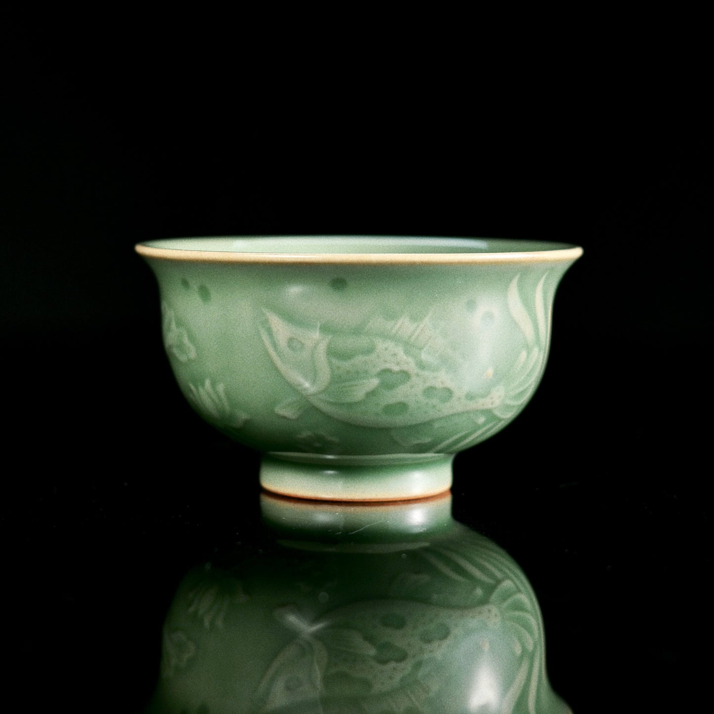 Longquan Celadon Plum-Green Relief-Carved Flowers Press Hand Teacup