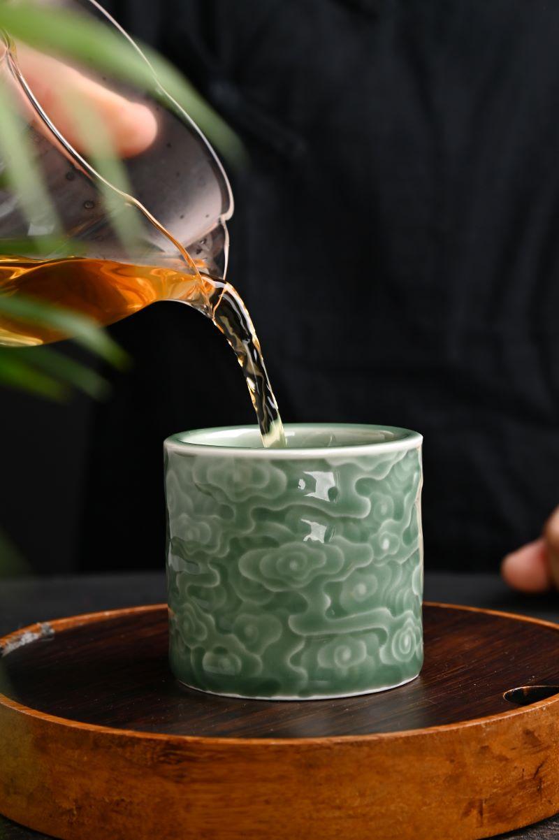 Elegant texture, serene color – the Longquan Celadon Cloud Embossed Cup.