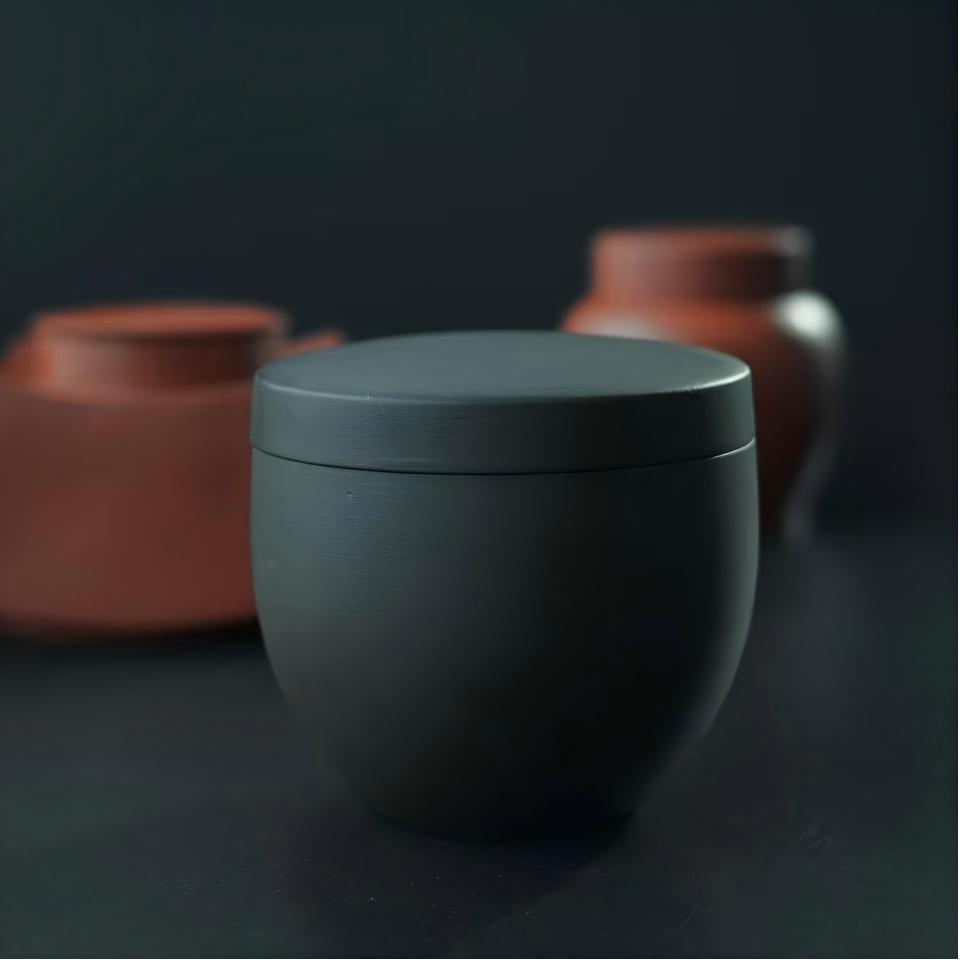 Traditional Yixing purple clay tea container with elegant retro style, perfect for travel and tea table decoration