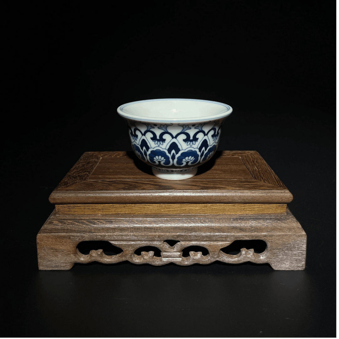 Blue and White Lotus Scrolling Pattern Cup with Baoxiang Design