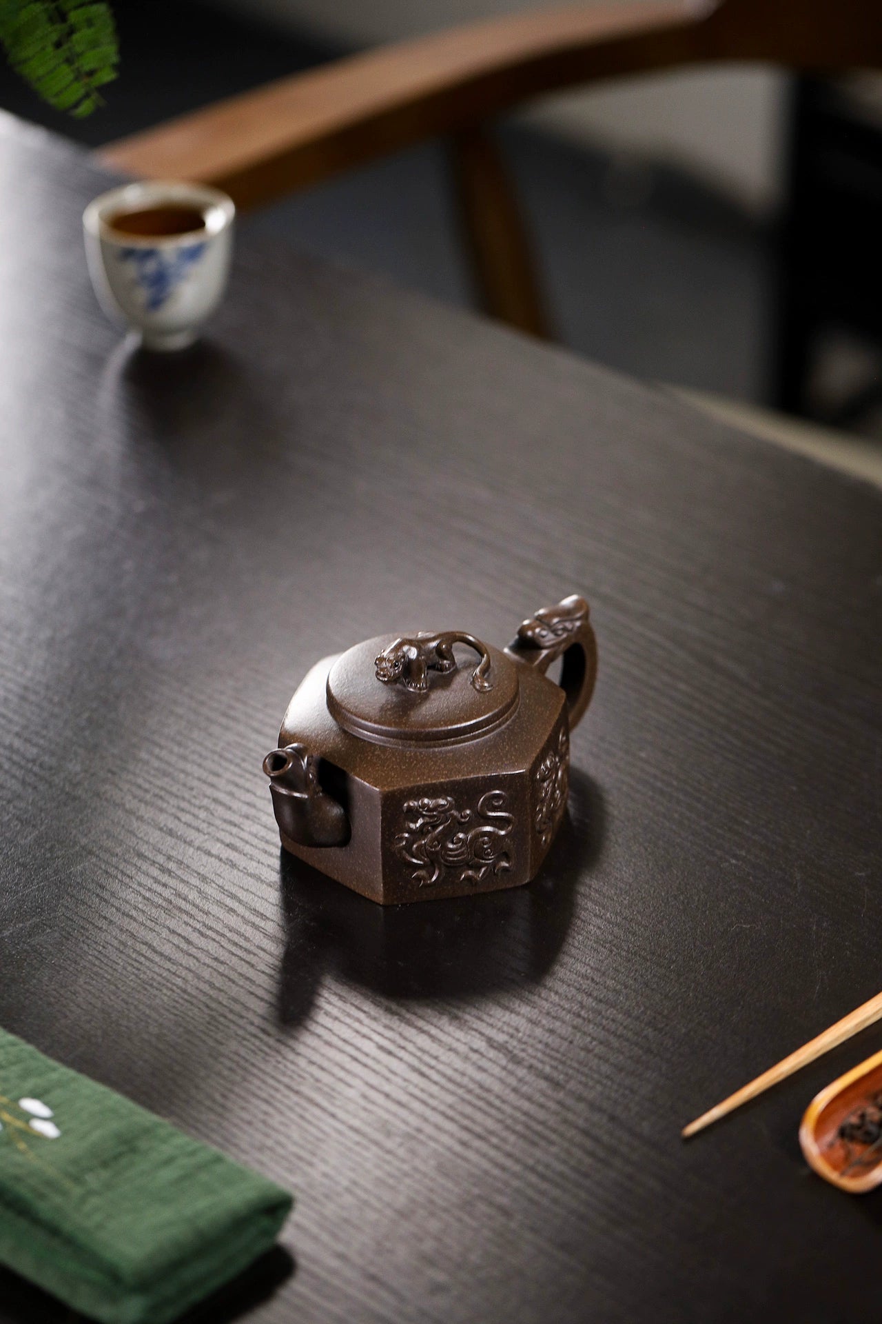 Elevate Every Pour: Exquisite Handcrafted Hexagonal Teapot from Original Yixing Ore Clay, Where Myth Inspires Craft.