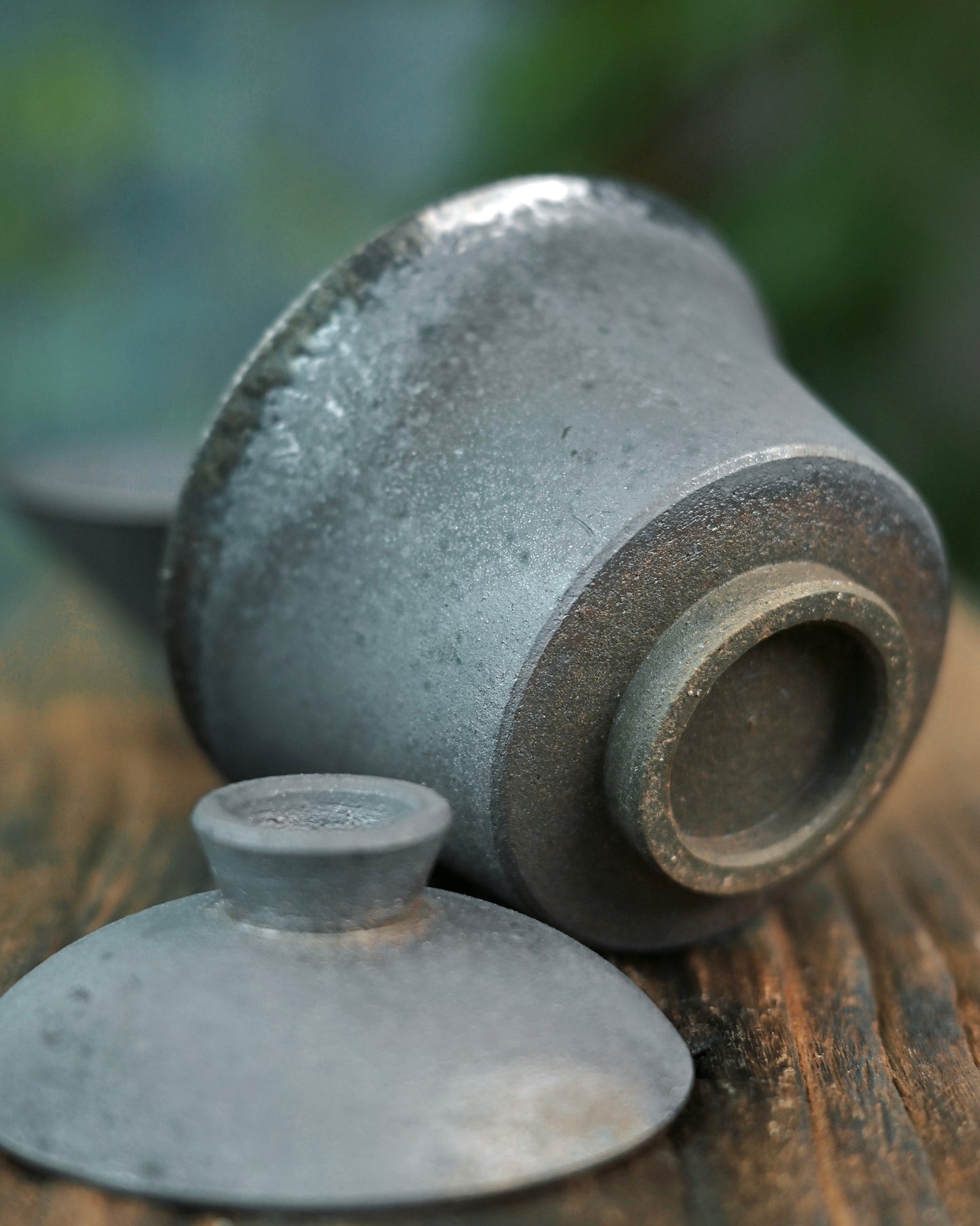 Pine wood firing technique creating unique surface variations through ash fusion