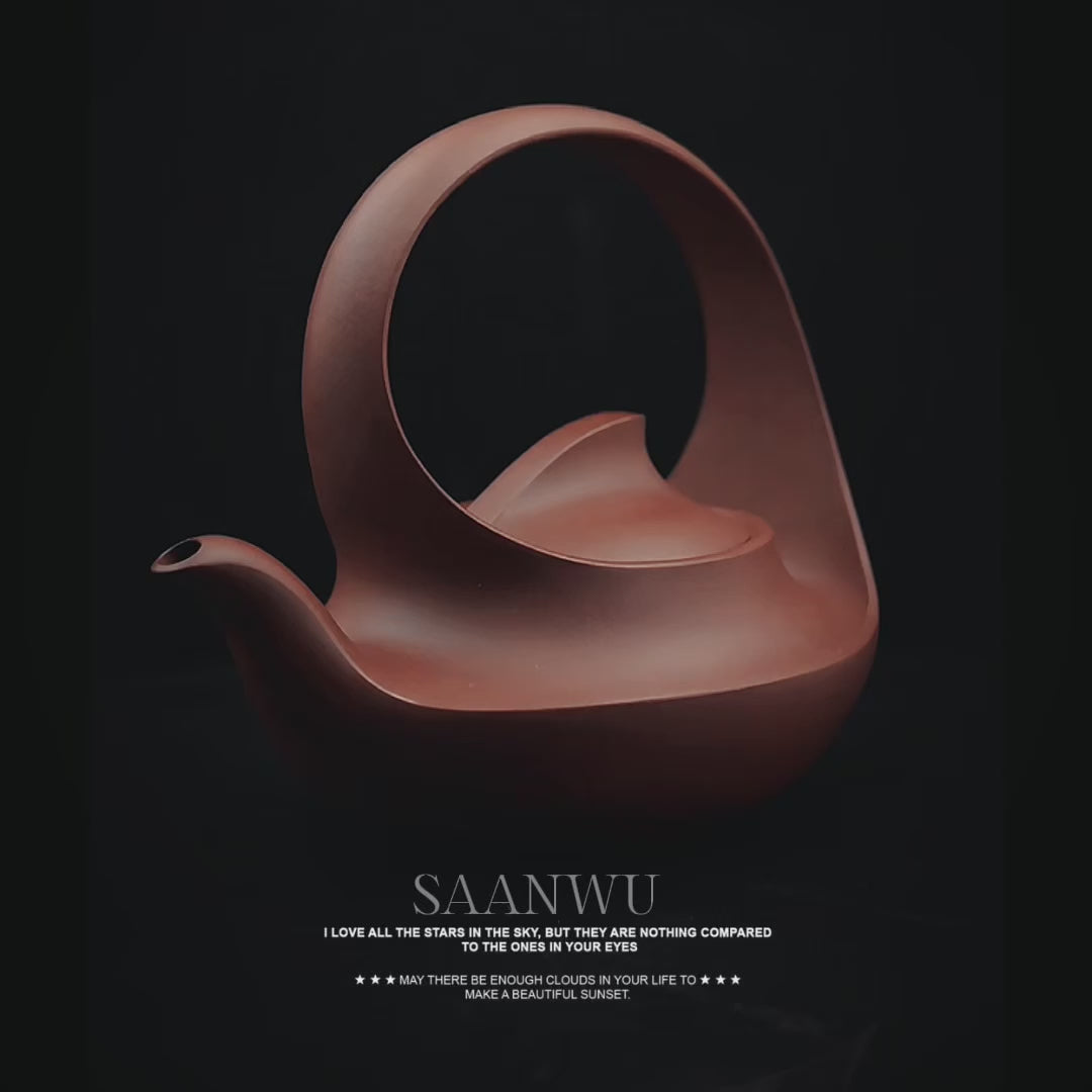Authentic Zisha clay reproduction of Wang Yinxian's iconic Qu Pot, featuring continuous spiral form and snail inspiration