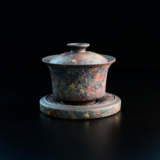 Yixing zisha gaiwan with exterior mineral gold accents, crafted from aged purple clay - an exquisite luxury gift piece for discerning tea connoisseurs.