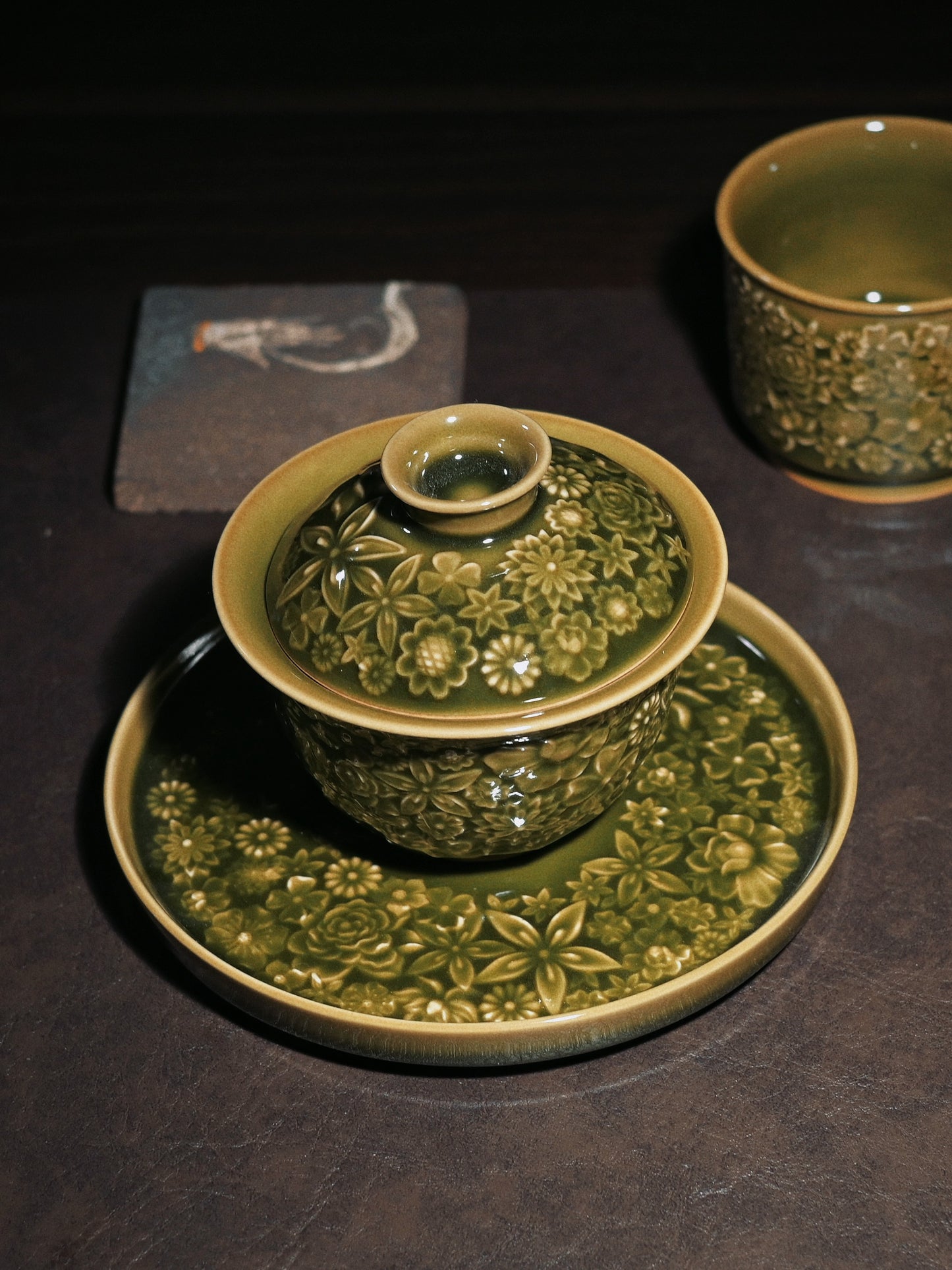 Longquan Celadon "Hundred Flowers" Relief-Carved Three-Piece Gaiwan Set