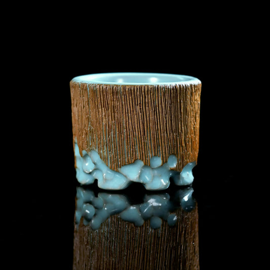 A hand-carved Ru Ware master cup with a smooth sky-blue glaze, inspired by Song dynasty porcelain traditions, perfect for elegant tea rituals.