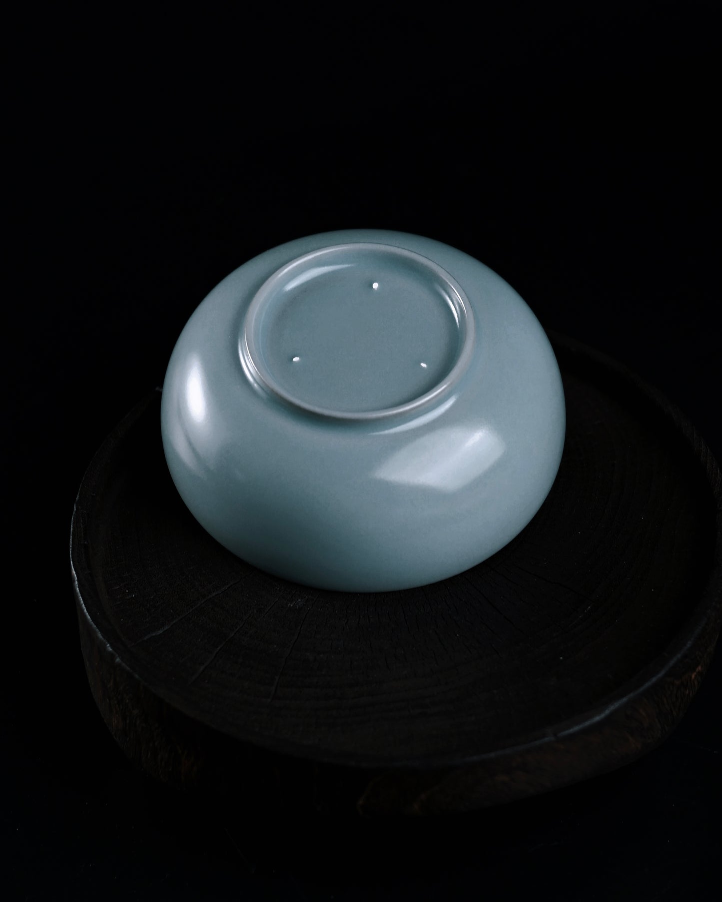 Fully glazed Ru ware tea bowl featuring crackle patterns that develop with tea exposure over time