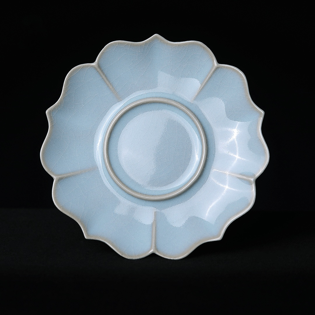 Song Dynasty style saucer with blooming sunflower rim and sky-blue Ru glaze, featuring authentic pin-marked base