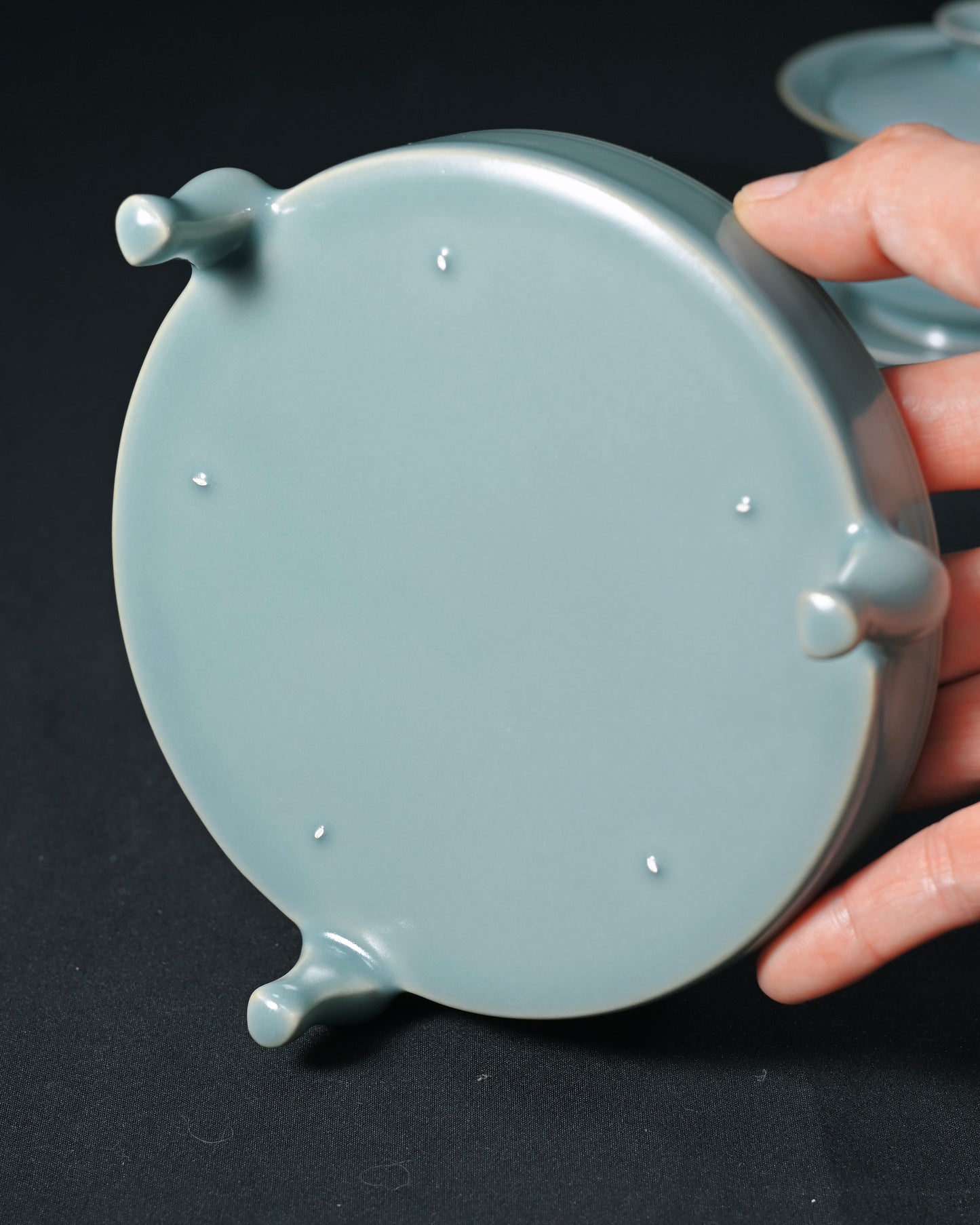 Authentic Ru ware reproduction with full sky-blue glaze, five-pin firing technique, and intentional crackle-free surface requiring precise kiln control