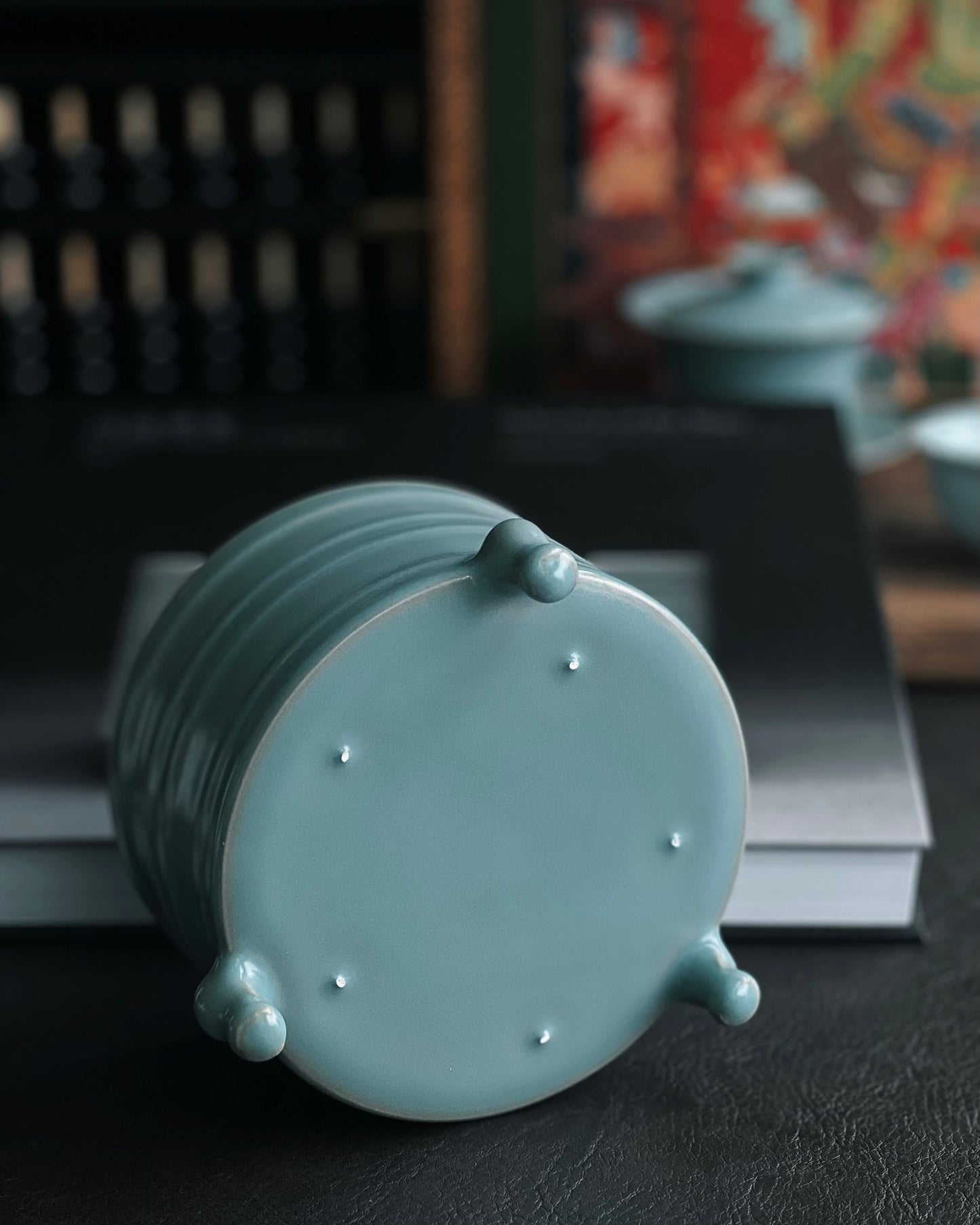 Satin-finish Ru ware Zun with subtle glaze variations and string pattern accents