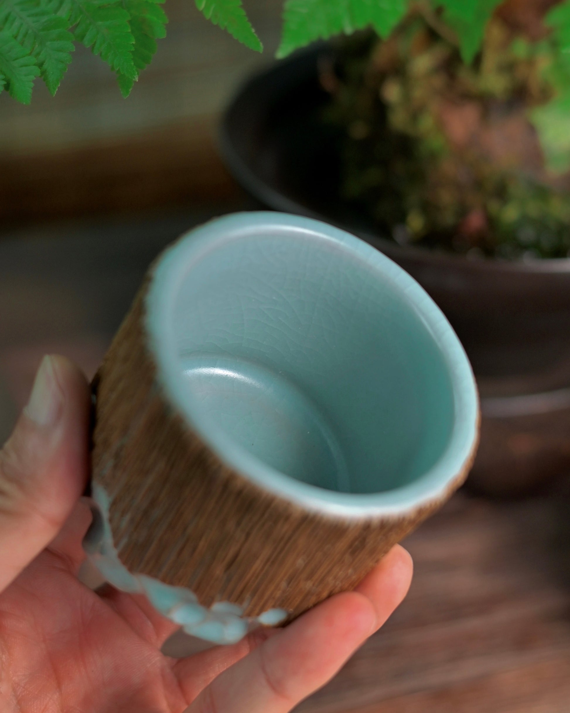 Authentic Ru kiln porcelain tea cup featuring delicate hand-carved details and a soft blue glaze, ideal for collectors and tea lovers