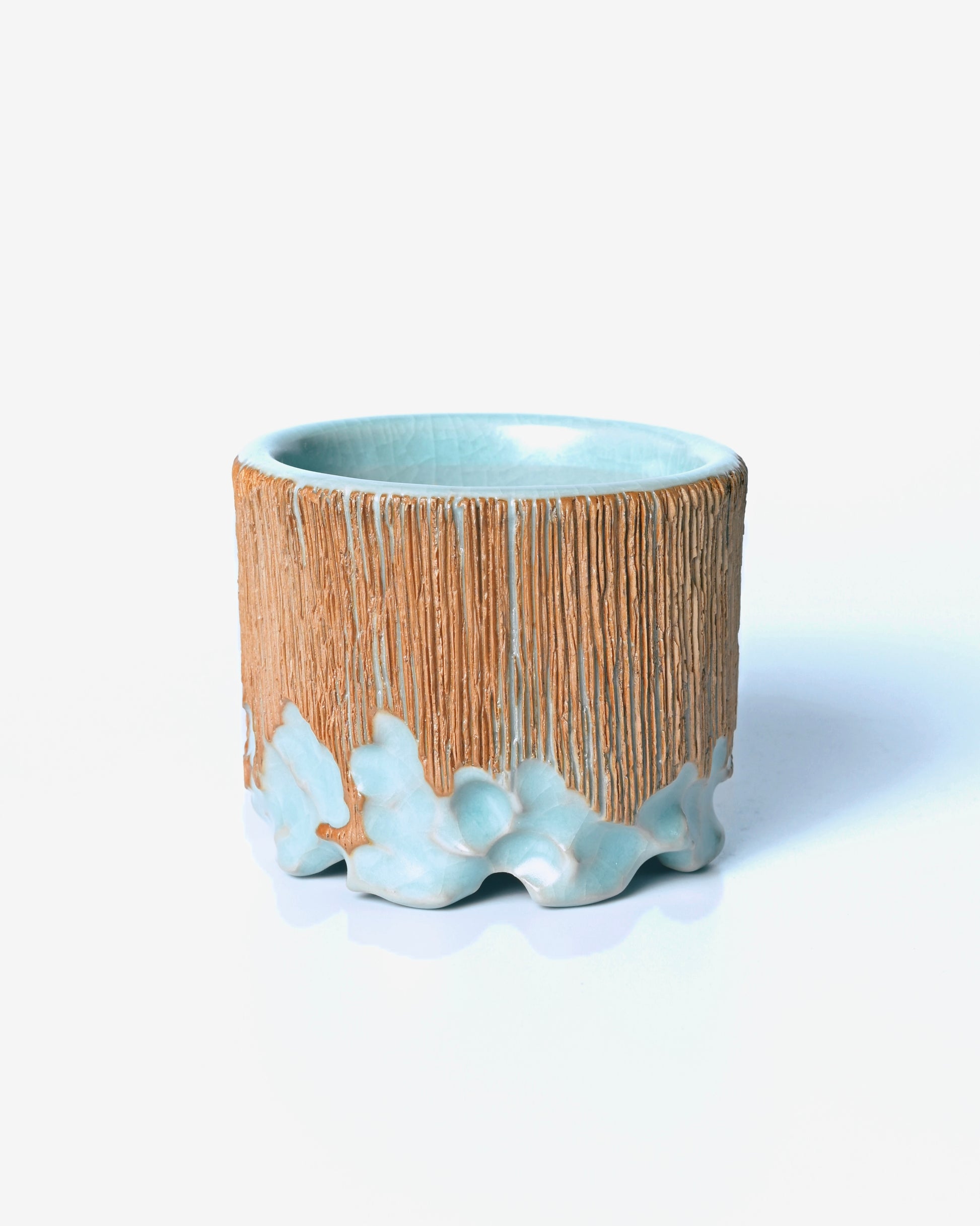 Collector’s Ru Ware master cup in sky-blue glaze, hand-carved with fine details that highlight traditional Chinese craftsmanship
