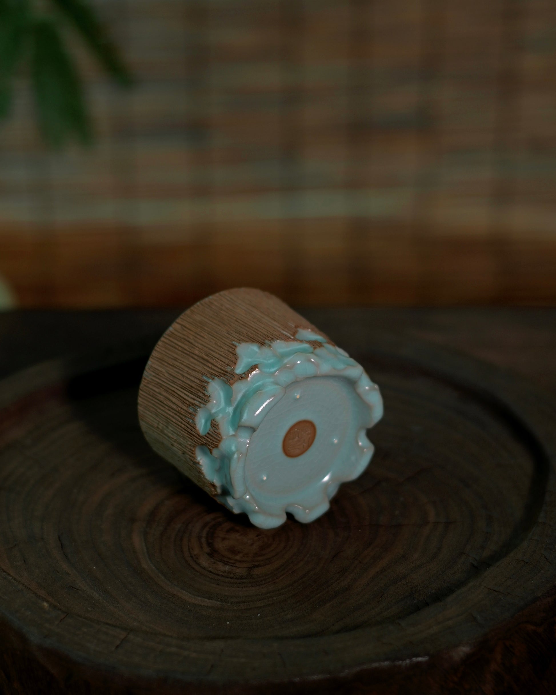 A Chinese Ru kiln tea cup with a glossy blue glaze, handmade and hand-carved for tea enthusiasts who value authentic porcelain