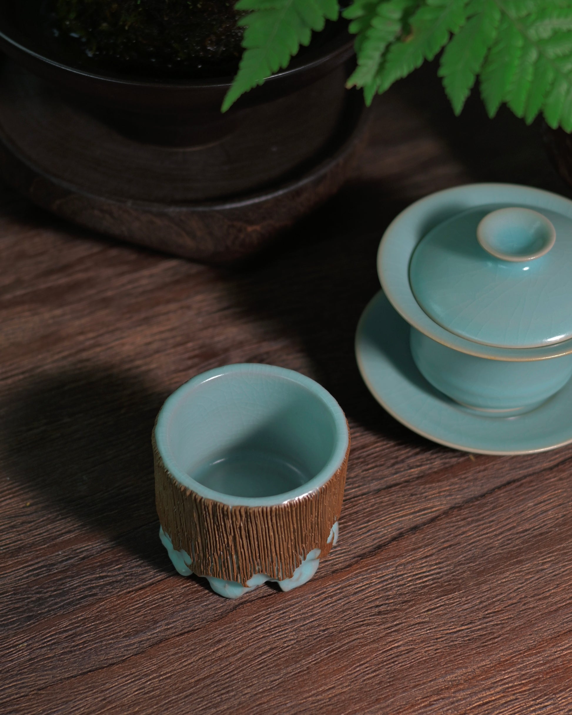 Hand-carved Ru porcelain tea master cup with a luminous blue glaze, reflecting the elegance of Song dynasty tea culture