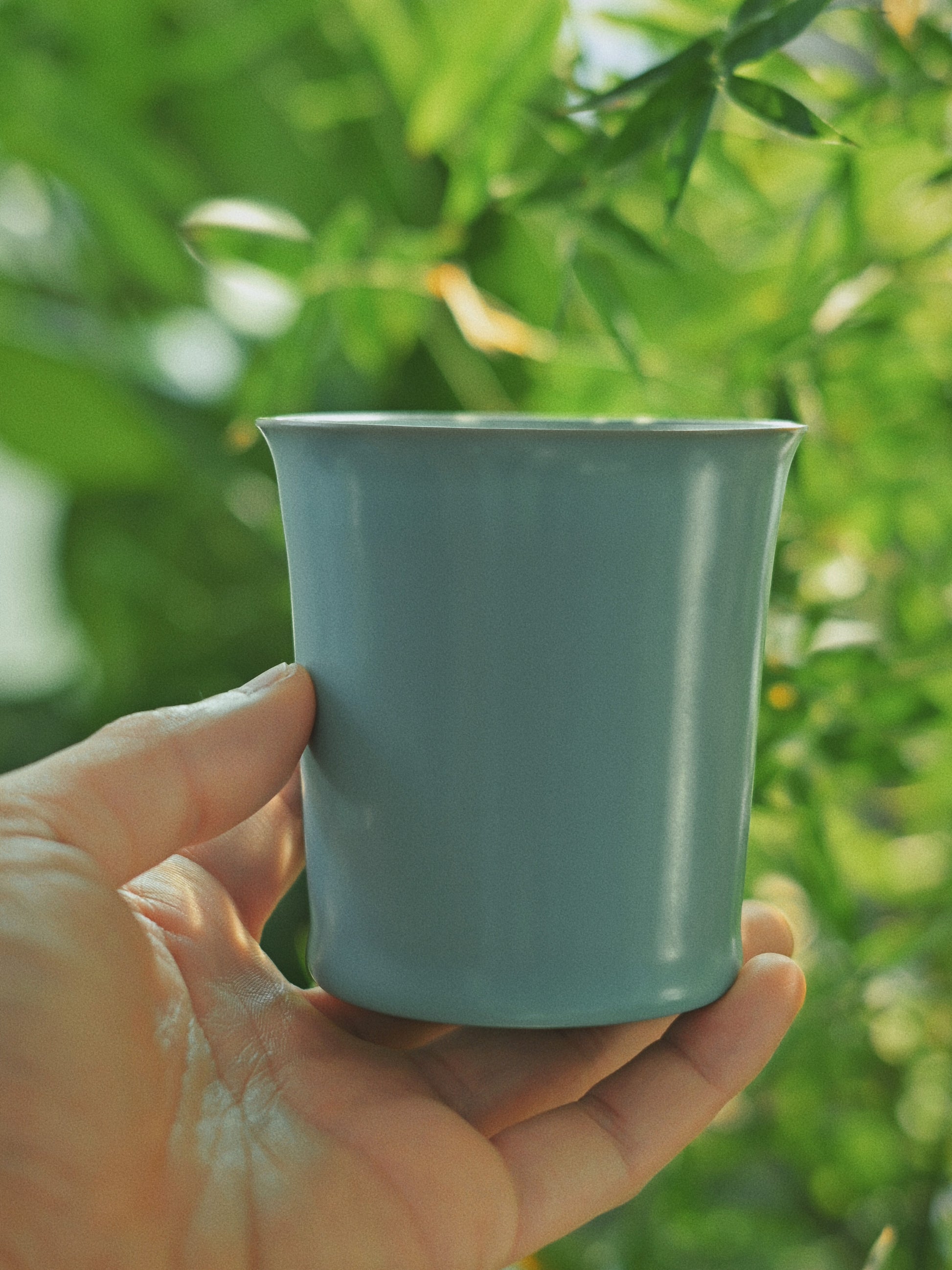 Traditional Chinese Ru kiln porcelain teacup with sky-blue glaze
