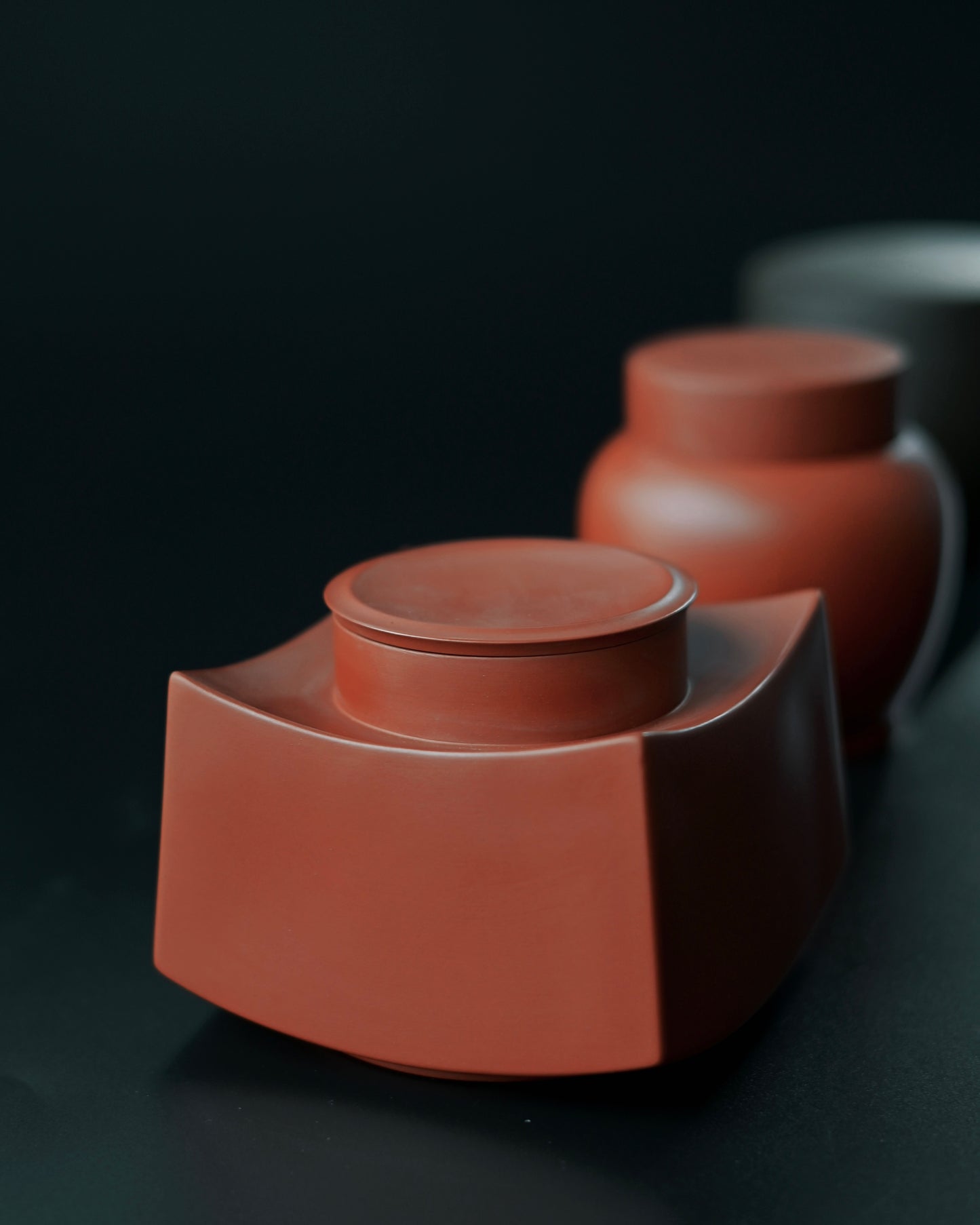Chinese-style Yixing tea caddy with compact size and traditional craftsmanship, perfect for tea travel